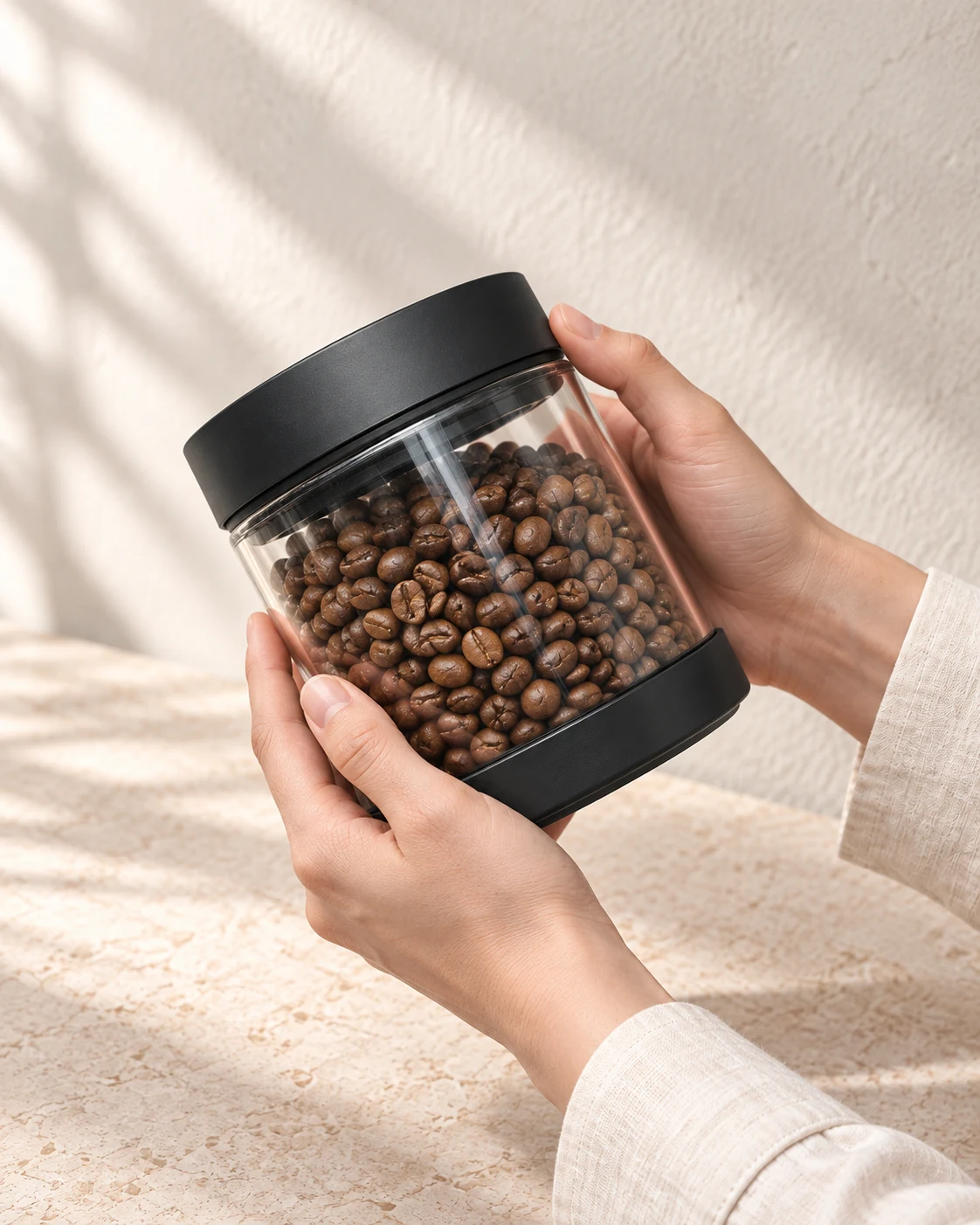 Hands holding the complete Roast Peak coffee jar, showing its compact size